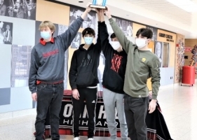 boys holding trophy